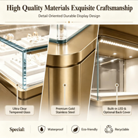 Vitrine à bijoux de luxe sur mesure avec cadre en métal doré et éclairage LED pour magasin de détail haut de gamme