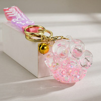 Mini-cadeau exquis - Porte-clés patte de chat en plastique écologique, créatif, en acrylique, avec perles lumineuses à l'huile et sable liquide