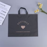 Emballage personnalisé Sac à provisions en plastique sac à provisions en plastique transparent PE personnalisé avec logo pour vêtement