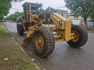 รถเกรดเดอร์มือสอง Caterpillar 14H สำหรับงานก่อสร้างถนน เกรดเดอร์ CAT 14H แท้ พร้อมเครื่องยนต์ 3306 สำหรับปรับระดับถนนและก่อสร้างทางหลวง - Product Image 1