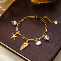 Bracelet en acier inoxydable avec breloques étoile de mer et coquillage, perles en céramique florales bleues, plaqué or 18K PVD, étanche, bijoux d'été
