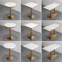 Table de restaurant carrée en pierre frittée Leer avec bord en PVC, base en acier inoxydable doré, design moderne, fonction plaque de cuisson à induction