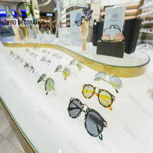 Gabinete de almacenamiento óptico profesional con puertas bloqueables Estantes de gafas ajustables para decoración de tienda óptica - Product Image 1