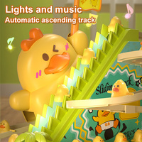 Jouet de piste circulaire interactif de parc d'amusement d'escalade d'escalier de canard acclamant amélioré avec des effets de lumière de musique pour des enfants