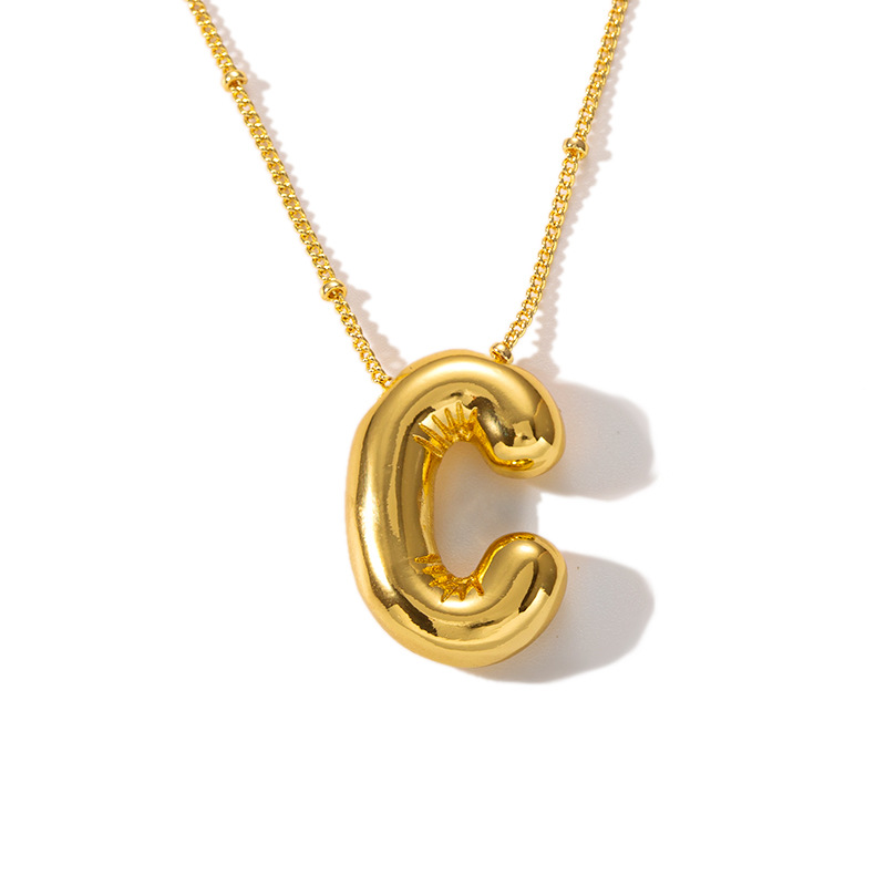 Gold C necklace