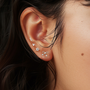 CANNER Juego de 4 Piezas de Aretes Pequeños de Plata de Ley 925 con Forma de Corazón, Lazo Simple, Flor Geométrica y Circonita para Mujeres y Niñas - Product Image 5