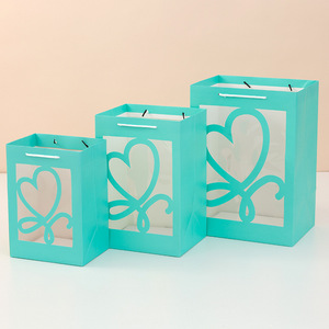 Sac cadeau créatif transparent pour la fête des enseignants Cartable en papier d'art avec fenêtre fleurie pour sac à main souvenir Bouquet Emballage <span class=keywords><strong>de</strong></span> poupée - Product Image 6