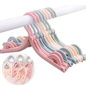Cintres à vêtements pliables en plastique de haute qualité, couleurs assorties, portables, pour le voyage et la maison, support multifonctionnel pour le séchage - Product Image 1