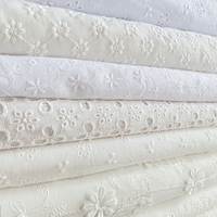 Chine usine prix Textile blanc brodé suisse Voile oeillet 100% coton broderie tissu pour femmes robe en tissu