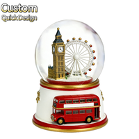 Globe à neige personnalisé en résine avec Big Ben et la Tour Eiffel de Londres, accompagné d'un bus rouge à deux étages, pour souvenirs de voyage