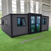 Maison préfabriquée modulaire extensible moderne à cadre noir, mini-maison de luxe, cabane de séjour en conteneur pour maison d'hôtes