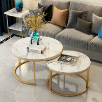 Table basse d'appoint moderne en pierre ronde avec structure métallique et rangement pour chambre et salon