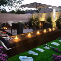 Petite fontaine à jets d'eau moderne multi-tension en acier inoxydable pour terrasse extérieure et piscine paysagère