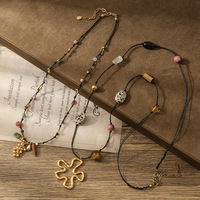 Automne hiver Vintage à la main or tissé pierre naturelle en acier inoxydable fleur collier de perles femmes Style ethnique chandail chaîne