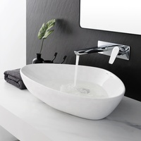 Robinet de lavabo mural en laiton brossé à poignée unique avec cartouche en céramique et design moderne