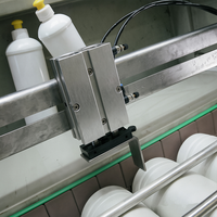 Machine de remplissage de liquides anti-corrosion à 12 têtes avec contrôle PLC et écran tactile pour l'embouteillage de produits blanchissants