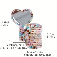 Mignon peigne à cheveux portable en acétate vintage en forme de cœur avec miroir intégré pour femmes