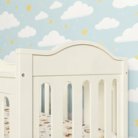 Lit bébé en bois blanc avec design arqué, lit convertible contemporain pour chambre d'enfant, maison, hôtel et école