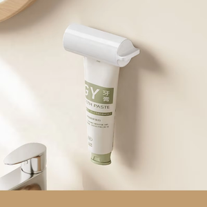 Wholesale Plastic <b>Toothpaste</b> Squeezer Facial Cleanser Hand Manual Seat Holder Stand Rotate Tool - Product Image 2