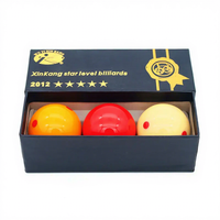 Prix direct usine Xinkang 5 étoiles 61,5 mm Boule de billard carom 3 pièces par boîte Utilisation en tournoi Résine phénolique
