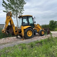 Mini-chargeur de fabrication chinoise d'excavatrice diesel de tracteur de KOMATSU 4x4 capacité de chargement de 2500 kilogrammes caractéristiques de pelle rétro avant chargeur