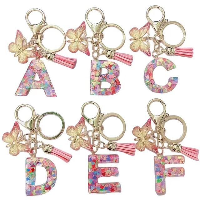 Hot Selling Women's Plastic Keychain Alloy Initial Letter Butterfly Pendant Acrylic Tassel Keychain for Bags Backpacks Anime