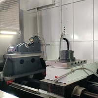 Machine-outil CNC à double tourneur DZ-4600V, adaptée au fraisage et au perçage simultanés des extrémités des pièces d'arbres et autres.