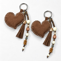 Mini breloque cœur mignonne en similicuir PU, avec pompon perlé et cordon tressé, utilisable comme porte-clés, sangle pour étui de téléphone ou pendentif créatif pour sac à dos