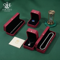 Boîte à bijoux octogonale avec doublure en velours et design élégant pour bagues, bracelets et colliers