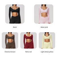Haut de sport pour femme à col halter, effet deux pièces, manches longues, rembourré, col en V, très élastique, coupe courte, pour Pilates, gym et course à pied