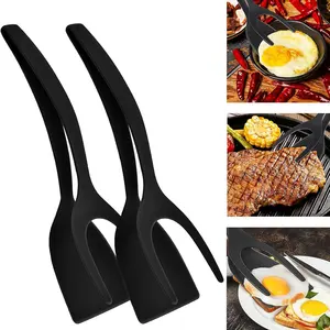 2024 nuovi gadget da cucina in silicone pinze 2 in 1 presa e flip spatola pinze per alimenti da cucina pinze per uova 2 in 1