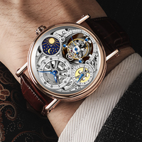 Conception et production en usine de montres mécaniques en acier de type GMT, avec phases soleil-lune et tourbillon, pour les marques privées des clients.