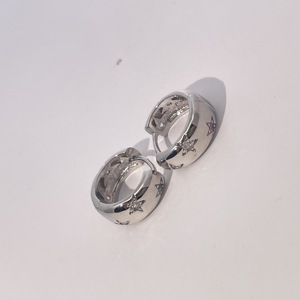 Tianyu Gems Gold-plated <b>Brass</b> Classic Women's Hoop Earrings with White Round Cubic Zirconia and Star Engraving - Product Image 1
