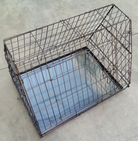 Cage pour chien en métal de haute qualité Cage pour chien en pente métallique Caisse pour animaux de compagnie pliable pour voyage en voiture facile Petits animaux Hotsale Enclosure Box Packing