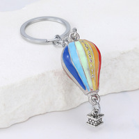 Nouveau style créatif, pendentif rond en alliage de zinc, porte-clés montgolfière, souvenir de sport de plein air, cadeau nuage, vente en gros