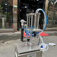 Machine de remplissage de parfum sous vide semi-automatique à tête unique