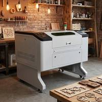 Graveur laser CO2 tout-en-un 7050 avec refroidisseur d'eau intégré, système Ruida, machine laser CNC 80W 100W pour acrylique, petites entreprises