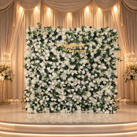 Nouvelle conception de mur de fleurs artificielles vert sur toile de fond déroulable pour la décoration de scène de mariage