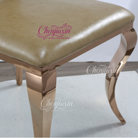 Chaises et tables de luxe en acier inoxydable de qualité supérieure, design moderne, durables, pour hôtels, événements extérieurs et mariages dorés.