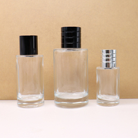Flacon de parfum en verre transparent rond de luxe cosmétique vide avec bouchon noir 30ml 50ml 100ml