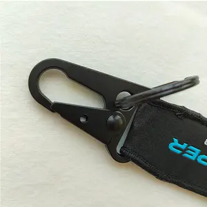Kişiselleştirilmiş özel dokuma anahtarlık etiketi kayış İngilizce etiketi tasarım Logo kumaş anahtarlıklar nakış anahtarlık