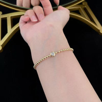 Bracciale Elastico Minimalista con Perle Rotonde Lucidate e Diamanti Coltivati in Laboratorio in Oro Giallo 18K, Gioielli Raffinati per Donne