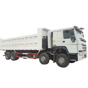 SinotrukHOWOトラック8x4関節式中古howoダンプトラック、工場価格RHDティッパートラックデポジット (タンザニアとウガンダ用)