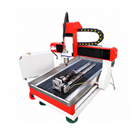 Router CNC de 4 Ejes Jinan Mosencnc 600x900 con Dispositivo Rotatorio, Husillo Refrigerado por Agua de 2.2kW, Mesa con Ranura en T, Motor Versátil para Corte/Grabado