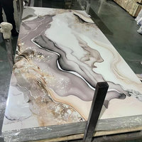 Plaque de marbre PVC ignifuge, écologique et imperméable de 1220*3*2440 mm pour la décoration murale intérieure des hôtels et villas, résistante aux UV.