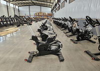 Nouveauté équipement de sport de résistance magnétique de forme physique commerciale cycle d'exercice dynamique électrique vélo de rotation pour la salle de sport