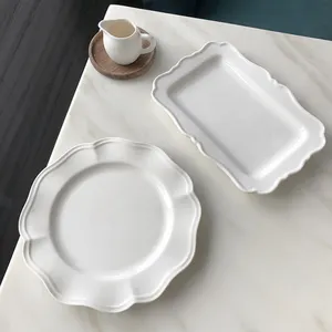 Grosir Piring Keramik Makan Malam Murah Piring Makanan Penutup Keramik Putih dengan Tepi Gelombang