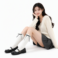Chaussettes rayées en tricot pour femmes, design nœud en ruban noir et blanc, chaussettes respirantes pour mollets, chaussettes pour femmes