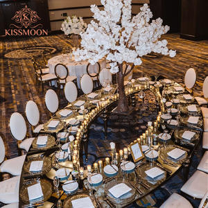 Juego de Mesa de Comedor de Acero Inoxidable Dorado con Tapa de Cristal Estilo Real, Mesa de Espejo Moderna de Lujo con Forma de Ojo para Eventos y Bodas - Product Image 1