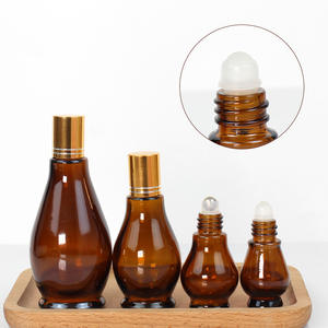 Bouteilles d'huile <span class=keywords><strong>de</strong></span> <span class=keywords><strong>parfum</strong></span> ambre en forme <span class=keywords><strong>de</strong></span> goutte d'<span class=keywords><strong>eau</strong></span> <span class=keywords><strong>de</strong></span> 10ml 20ml 30ml 50ml 100ml avec boîte vente en gros - Product Image 3